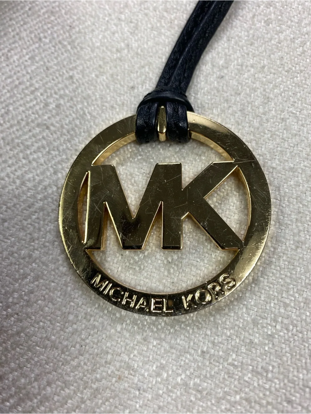 Michael Kors Black Grain Leather Hobo with Gold MK Charm